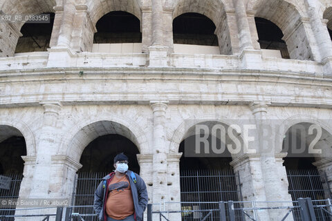 Rome March 10, 2020..Rome, a boy waiting for the bus at the Colosseum stop during the Coronavirus epidemic/Roma, un ragazzo in attesa del bus alla fermata Colosseo durante lepidemia Coronavirus ©Rino Bianchi/Rosebud2