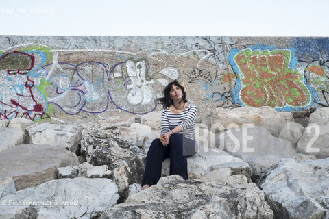 San Felice Circeo September 16, 2019..Ilaria Gaspari, philosopher, writer and essayist, photographed in San Felice Circeo on the bench facing the sea/Ilaria Gaspari, filosofa, scrittrice e saggista, fotografata a San Felice Circeo sulla panchina fronte mare. ©Rino Bianchi/Rosebud2