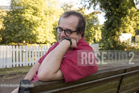 Rome June 26, 2021..Andrea Cortellessa literary critic, historian of Italian literature, associate professor at the degree course in Communication of the Roma Tre University and essayist, photographed at Villa Ada on the occasion of the potico reading dedicated to Renato Nicolini/Andrea Cortellessa critico letterario, storico della letteratura italiana, professore associato presso il corso di laurea in Comunicazione dellUniversità degli Studi Roma Tre e saggista, fotografato a Villa Ada in occasione del reading potico dedicato a Renato Nicolini. ©Rino Bianchi/Rosebud2