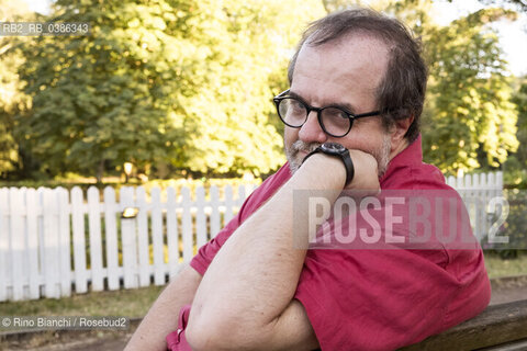 Rome June 26, 2021..Andrea Cortellessa literary critic, historian of Italian literature, associate professor at the degree course in Communication of the Roma Tre University and essayist, photographed at Villa Ada on the occasion of the potico reading dedicated to Renato Nicolini/Andrea Cortellessa critico letterario, storico della letteratura italiana, professore associato presso il corso di laurea in Comunicazione dellUniversità degli Studi Roma Tre e saggista, fotografato a Villa Ada in occasione del reading potico dedicato a Renato Nicolini. ©Rino Bianchi/Rosebud2