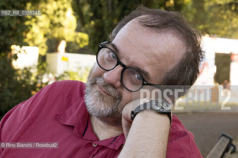 Rome June 26, 2021..Andrea Cortellessa literary critic, historian of Italian literature, associate professor at the degree course in Communication of the Roma Tre University and essayist, photographed at Villa Ada on the occasion of the potico reading dedicated to Renato Nicolini/Andrea Cortellessa critico letterario, storico della letteratura italiana, professore associato presso il corso di laurea in Comunicazione dellUniversità degli Studi Roma Tre e saggista, fotografato a Villa Ada in occasione del reading potico dedicato a Renato Nicolini. ©Rino Bianchi/Rosebud2