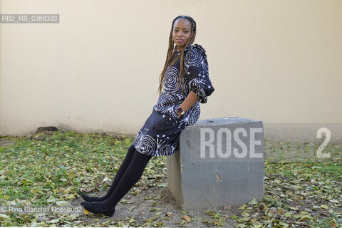 Turin October 16, 2021..Abimbola Daré in literature Abi Darè, Nigerian author who now lives in Essex, England, winner of the Bath Novel Award in 2018, photographed in Turin in the Lingotto spaces/Abimbola Daré in letteratura Abi Darè, autrice nigeriana che ora vive nellEssex , in Inghilterra, vincitrice del Bath Novel Award nel 2018, fotografata a Torino negli spazi del Lingotto. ©Rino Bianchi/Rosebud2