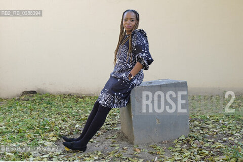 Turin October 16, 2021..Abimbola Daré in literature Abi Darè, Nigerian author who now lives in Essex, England, winner of the Bath Novel Award in 2018, photographed in Turin in the Lingotto spaces/Abimbola Daré in letteratura Abi Darè, autrice nigeriana che ora vive nellEssex , in Inghilterra, vincitrice del Bath Novel Award nel 2018, fotografata a Torino negli spazi del Lingotto. ©Rino Bianchi/Rosebud2