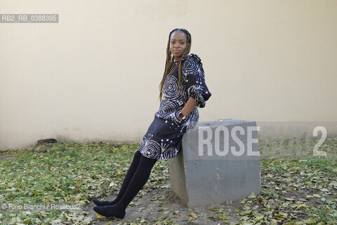 Turin October 16, 2021..Abimbola Daré in literature Abi Darè, Nigerian author who now lives in Essex, England, winner of the Bath Novel Award in 2018, photographed in Turin in the Lingotto spaces/Abimbola Daré in letteratura Abi Darè, autrice nigeriana che ora vive nellEssex , in Inghilterra, vincitrice del Bath Novel Award nel 2018, fotografata a Torino negli spazi del Lingotto. ©Rino Bianchi/Rosebud2