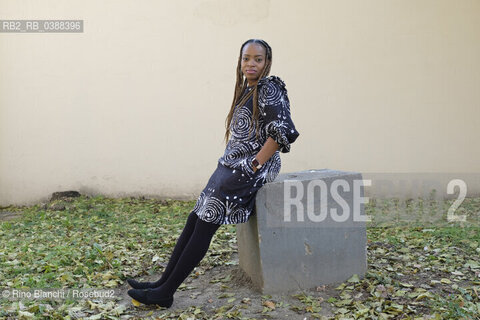 Turin October 16, 2021..Abimbola Daré in literature Abi Darè, Nigerian author who now lives in Essex, England, winner of the Bath Novel Award in 2018, photographed in Turin in the Lingotto spaces/Abimbola Daré in letteratura Abi Darè, autrice nigeriana che ora vive nellEssex , in Inghilterra, vincitrice del Bath Novel Award nel 2018, fotografata a Torino negli spazi del Lingotto. ©Rino Bianchi/Rosebud2