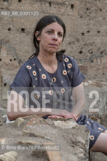 Rome July 12, 2022..Emmanuelle Pagano, French writer, author of numerous books that have been translated into more than a dozen languages and won the EU Prize for Literature with her novel Les Adolescents troglodytes, photographed in Rome in the Palatine Stadium/Emmanuelle Pagano, scrittrice francese, autrice di numerosi libri che sono stati tradotti in più di una dozzina di lingue e si è aggiudicata il Premio dellUE per la letteratura con il romanzo Les Adolescents troglodytes, fotografata a Roma nello Stadio Palatino. ©Rino Bianchi/Rosebud2