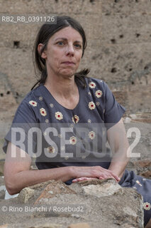 Rome July 12, 2022..Emmanuelle Pagano, French writer, author of numerous books that have been translated into more than a dozen languages and won the EU Prize for Literature with her novel Les Adolescents troglodytes, photographed in Rome in the Palatine Stadium/Emmanuelle Pagano, scrittrice francese, autrice di numerosi libri che sono stati tradotti in più di una dozzina di lingue e si è aggiudicata il Premio dellUE per la letteratura con il romanzo Les Adolescents troglodytes, fotografata a Roma nello Stadio Palatino. ©Rino Bianchi/Rosebud2