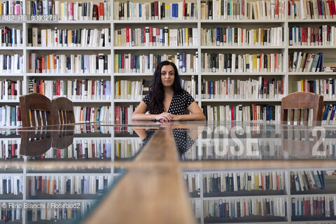 Biella(BI) September 3, 2023..Elisa Casseri writer, playwright and television and cinema author, collaborator of the magazine «Nuovi Argomenti», author of the blogs «Melotecnica» and «Memories of a drinker of Estathè», photographed in Biella in the spaces of the Civic Library/Elisa Casseri scrittrice, drammaturga e autrice televisiva e cinematografica, collaboratrice della rivista «Nuovi Argomenti»,  autrice dei blog «Melotecnica» e «Memorie di una bevitrice di Estathè», fotografata a Biella negli spazi della Biblioteca Civica. ©Rino Bianchi/Rosebud2