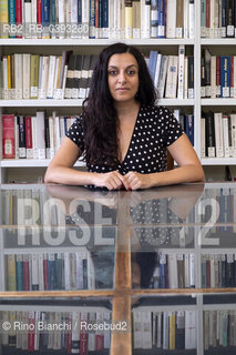 Biella(BI) September 3, 2023..Elisa Casseri writer, playwright and television and cinema author, collaborator of the magazine «Nuovi Argomenti», author of the blogs «Melotecnica» and «Memories of a drinker of Estathè», photographed in Biella in the spaces of the Civic Library/Elisa Casseri scrittrice, drammaturga e autrice televisiva e cinematografica, collaboratrice della rivista «Nuovi Argomenti»,  autrice dei blog «Melotecnica» e «Memorie di una bevitrice di Estathè», fotografata a Biella negli spazi della Biblioteca Civica. ©Rino Bianchi/Rosebud2