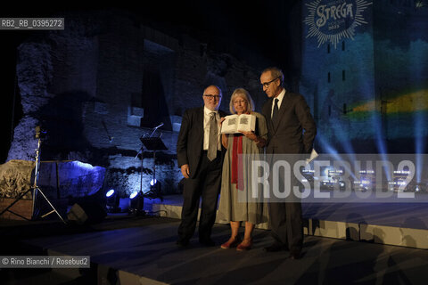 Rome October 5 2023..Vivian Lamarque, poet, with Giuseppe DAvino, and Giovanni Solimine photographed at the final evening of the first edition of the Strega Poetry Prize, in the archaeological park of the Colosseum/Vivian Lamarque, poetessa, con Giuseppe DAvino, Giovanni Solimine, fotografati alla serata conclusiva del Premio Strega Poesia prima edizione, nel parco archeologico del Colosseo. ©Rino Bianchi/Rosebud2