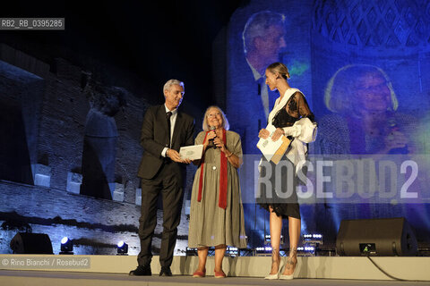 Rome October 5 2023..Vivian Lamarque, poet, with Ema Stokholma and the External Relations manager of BPER Banca Gilberto Borghi, photographed at the final evening of the first edition of the Strega Poetry Prize, in the archaeological park of the Colosseum/Vivian Lamarque, poetessa, con Ema Stokholma ed il responsabile External Relations di BPER Banca Gilberto Borghi, fotografati alla serata conclusiva del Premio Strega Poesia prima edizione, nel parco archeologico del Colosseo. ©Rino Bianchi/Rosebud2