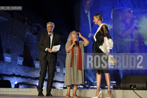 Rome October 5 2023..Vivian Lamarque, poet, with Ema Stokholma and the External Relations manager of BPER Banca Gilberto Borghi, photographed at the final evening of the first edition of the Strega Poetry Prize, in the archaeological park of the Colosseum/Vivian Lamarque, poetessa, con Ema Stokholma ed il responsabile External Relations di BPER Banca Gilberto Borghi, fotografati alla serata conclusiva del Premio Strega Poesia prima edizione, nel parco archeologico del Colosseo. ©Rino Bianchi/Rosebud2