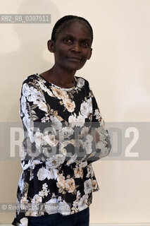 Vercelli october 26, 2023..Susan Nalugwa Kiguli, Ugandan poet and writer, associate professor of literature at the University of Makerere, supporter of creative writing in Africa, photographed in Vercelli in the main hall of the Lagrangia Classical High School during the Civil Poetry festival/Susan Nalugwa Kiguli poetessa e letterata ugandese, professore associato di letteratura presso lUniversità di Makerere, sostenitrice   della scrittura creativa in Africa, fotografata a Vercelli nellaula magna del Liceo Classico Lagrangia durante il festival di Poesia Civile. ©Rino Bianchi/Rosebud2