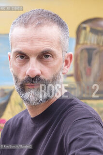 Brancaleone(RC) August 3, 2024..Alessio Torino, writer, Latinist, professor at the University of Urbino, photographed in Brancaleone in the confinement home of Cesare Pavese/Alessio Torino, scrittore, latinista, docente presso lUniversità di Urbino, fotografato a Brancaleone nella dimora di confino di Cesare Pavese. ©Rino Bianchi/Rosebud2