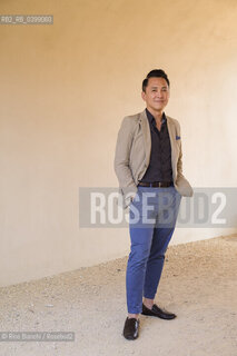 Novara September 2, 2024..Viet Thanh Nguyen blogger and writer of Vietnamese origins. He teaches English and American Studies and Ethnicity at the University of Southern California, Pulitzer Prize 2016, photographed in Novara in the spaces of the Castello Sforzesco/Viet Thanh Nguyen blogger e scrittore di origini vietnamite. Insegna English and American Studies and Ethnicity alla University of Southern California, Premio Pulitzer 2016, fotografato a Novara negli spazi del Castello Sforzesco. ©Rino Bianchi/Rosebud2