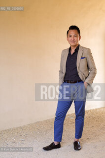 Novara September 2, 2024..Viet Thanh Nguyen blogger and writer of Vietnamese origins. He teaches English and American Studies and Ethnicity at the University of Southern California, Pulitzer Prize 2016, photographed in Novara in the spaces of the Castello Sforzesco/Viet Thanh Nguyen blogger e scrittore di origini vietnamite. Insegna English and American Studies and Ethnicity alla University of Southern California, Premio Pulitzer 2016, fotografato a Novara negli spazi del Castello Sforzesco. ©Rino Bianchi/Rosebud2