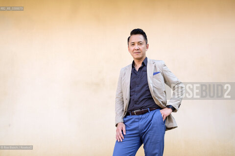 Novara September 2, 2024..Viet Thanh Nguyen blogger and writer of Vietnamese origins. He teaches English and American Studies and Ethnicity at the University of Southern California, Pulitzer Prize 2016, photographed in Novara in the spaces of the Castello Sforzesco/Viet Thanh Nguyen blogger e scrittore di origini vietnamite. Insegna English and American Studies and Ethnicity alla University of Southern California, Premio Pulitzer 2016, fotografato a Novara negli spazi del Castello Sforzesco. ©Rino Bianchi/Rosebud2