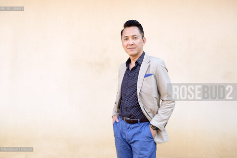 Novara September 2, 2024..Viet Thanh Nguyen blogger and writer of Vietnamese origins. He teaches English and American Studies and Ethnicity at the University of Southern California, Pulitzer Prize 2016, photographed in Novara in the spaces of the Castello Sforzesco/Viet Thanh Nguyen blogger e scrittore di origini vietnamite. Insegna English and American Studies and Ethnicity alla University of Southern California, Premio Pulitzer 2016, fotografato a Novara negli spazi del Castello Sforzesco. ©Rino Bianchi/Rosebud2