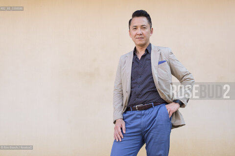 Novara September 2, 2024..Viet Thanh Nguyen blogger and writer of Vietnamese origins. He teaches English and American Studies and Ethnicity at the University of Southern California, Pulitzer Prize 2016, photographed in Novara in the spaces of the Castello Sforzesco/Viet Thanh Nguyen blogger e scrittore di origini vietnamite. Insegna English and American Studies and Ethnicity alla University of Southern California, Premio Pulitzer 2016, fotografato a Novara negli spazi del Castello Sforzesco. ©Rino Bianchi/Rosebud2