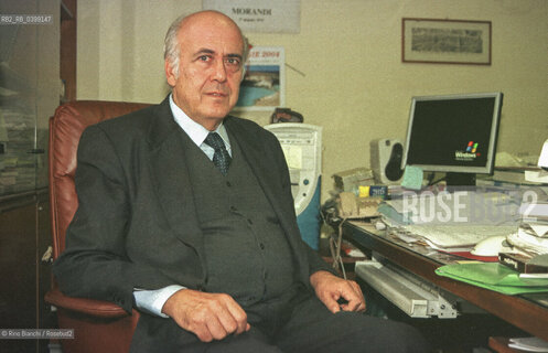 Rome, October 31, 2003..Antonio Golini, full professor of demography at La Sapienza University of Rome, pictured in his office at Via Nomentana 41/Antonio Golini, professore ordinario di demografia presso lUniversità La Sapienza di Roma, ritratto nel suo ufficio di via Nomentana 41. ©Rino Bianchi/Rosebud2