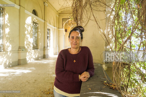 Vercelli November 21, 2024..Gabriella Ghermandi singer, performer, writer of novels and short stories, photographed in the rooms of the University of Eastern Piedmont (UPO) during the conference Deconstructing the Racial Imagination in Italy (1930-20/Gabriella Ghermandi cantante, performer, scrittrice di romanzi e racconti, fotografata negli ambienti dellUniversità del Piemonte Orientale(UPO) durante il convegno Decostruire limmaginazione razziale in Italia(1930-2020) ©Rino Bianchi/Rosebud2