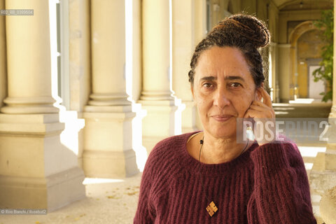 Vercelli November 21, 2024..Gabriella Ghermandi singer, performer, writer of novels and short stories, photographed in the rooms of the University of Eastern Piedmont (UPO) during the conference Deconstructing the Racial Imagination in Italy (1930-20/Gabriella Ghermandi cantante, performer, scrittrice di romanzi e racconti, fotografata negli ambienti dellUniversità del Piemonte Orientale(UPO) durante il convegno Decostruire limmaginazione razziale in Italia(1930-2020) ©Rino Bianchi/Rosebud2