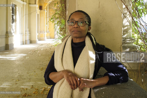 Vercelli November 22, 2024..Kombola Tanesini Ramadhani Mussa, Italianist, essayist, scholar of migrant literatures, photographed in Vercelli in the rooms of the University of Eastern Piedmont (UPO) during the conference Deconstructing the Racial Imagination in Italy (1930-2020)/Kombola Tanesini Ramadhani Mussa, italianista, saggista, studiosa delle letterature migranti, fotografata a Vercelli negli ambienti dellUniversità del Piemonte Orientale(UPO) durante il convegno Decostruire limmaginario razziale in Italia(1930-2020) ©Rino Bianchi/Rosebud2