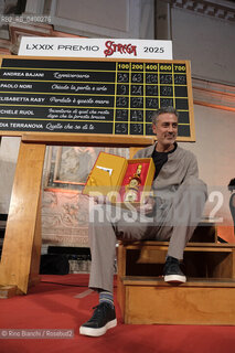 Rome July 3, 2025..Andrea Bajani, writer, author of novels and short stories, but also of reportages, plays and translations of works from French and English, professor of creative writing at Rice University, photographed at the Ninfeo di Villa Giulia after having won, with the novel Lanniversario (Feltrinelli, 2025), the 79th edition of the Strega Prize and the Strega Giovani Prize/Andrea Bajani, scrittore, autore di romanzi e racconti, ma anche di reportage, opere teatrali e traduzioni di opere dal francese e dallinglese, docente di scrittura creativa presso la Rice University, fotografato al Ninfeo di Villa Giulia dopo essersi aggiudicato, con il romanzo Lanniversario (Feltrinelli, 2025), la 79esima edizione del Premio Strega e il Premio Strega Giovani. ©Rino Bianchi/Rosebud2