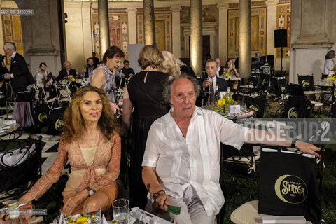 Rome July 3, 2025..The writer, journalist, polemicist Fulvio Abbate with the actress Eleonora Vallone photographed in the Nymphaeum of Villa Giulia during the 79th edition of the Strega Prize/Lo scrittore, giornalista, polemista Fulvio Abbate con lattrice Eleonora Vallone fotografati nel Ninfeo di Villa Giulia durante la 79esima edizione del Premio Strega. ©Rino Bianchi/Rosebud2