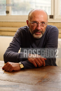 Turin November 15, 2025..Mauro Covacich, writer and contributor to Corriere della Sera, photographed in Turin at the Circolo dei lettori during the Radici Festival/Mauro Covacich, scrittore e autore, collaboratore del Corriere della Sera, fotografatoa Torino negli spazi del Circolo dei lettori durante il Festival Radici. ©Rino Bianchi/Rosebud2