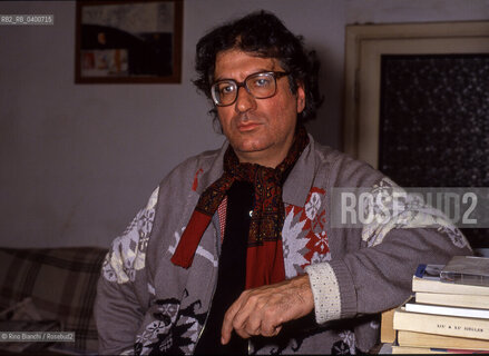 Rome March 20, 1993..Dario Bellezza, poet and writer, portrayed in his home on Via dei Pettinari in Rome/Dario Bellezza, poeta e scrittore, ritratto nella sua abitazione di via dei Pettinari a Roma. ©Rino Bianchi/Rosebud2