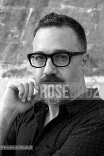Rome August 29, 2018..Andrea Pomella, writer and essayist, photographed in Rome near Ponte Milvio on the banks of the Tiber/Andrea Pomella, scrittore e saggista, fotografato a Roma nei pressi di Ponte Milvio sulle rive del Tevere. ©Rino Bianchi/Rosebud2