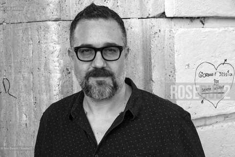 Rome August 29, 2018..Andrea Pomella, writer and essayist, photographed in Rome near Ponte Milvio on the banks of the Tiber/Andrea Pomella, scrittore e saggista, fotografato a Roma nei pressi di Ponte Milvio sulle rive del Tevere. ©Rino Bianchi/Rosebud2