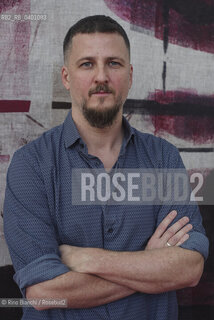 Rome December 7, 2025..Lorenzo Monfregola, a freelance Italian-German journalist and essayist, photographed in Rome at La Nuvola/Lorenzo Monfregola, giornalista italo tedesco freelance, saggista, fotografato a Roma negli spazi de La Nuvola. ©Rino Bianchi/Rosebud2