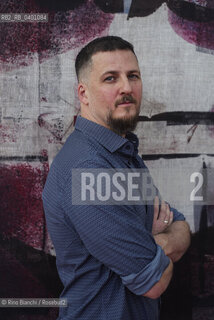 Rome December 7, 2025..Lorenzo Monfregola, a freelance Italian-German journalist and essayist, photographed in Rome at La Nuvola/Lorenzo Monfregola, giornalista italo tedesco freelance, saggista, fotografato a Roma negli spazi de La Nuvola. ©Rino Bianchi/Rosebud2