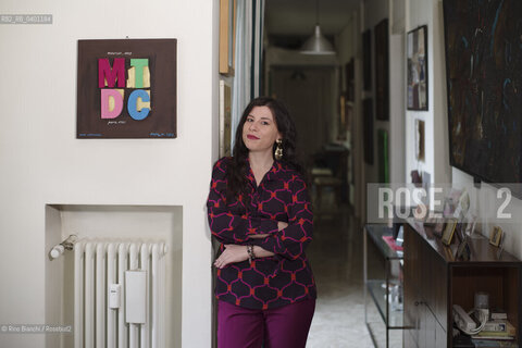 Turin January 19, 2026..Monica Acito, writer, middle school humanities teacher, and contributor to the cultural supplement Robinson, photographed in her home in the Quadrilatero district of Turin/Monica Acito scrittrice, docente di discipline umanistiche presso la scuola secondaria di primo e secondo grado, collaboratrice dellinserto culturale Robinson, fotografata nella sua abitazione nel Quadrilatero di Torino. ©Rino Bianchi/Rosebud2