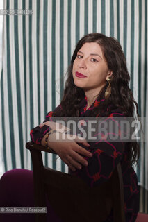 Turin January 19, 2026..Monica Acito, writer, middle school humanities teacher, and contributor to the cultural supplement Robinson, photographed in her home in the Quadrilatero district of Turin/Monica Acito scrittrice, docente di discipline umanistiche presso la scuola secondaria di primo e secondo grado, collaboratrice dellinserto culturale Robinson, fotografata nella sua abitazione nel Quadrilatero di Torino. ©Rino Bianchi/Rosebud2