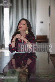 Turin January 19, 2026..Monica Acito, writer, middle school humanities teacher, and contributor to the cultural supplement Robinson, photographed in her home in the Quadrilatero district of Turin/Monica Acito scrittrice, docente di discipline umanistiche presso la scuola secondaria di primo e secondo grado, collaboratrice dellinserto culturale Robinson, fotografata nella sua abitazione nel Quadrilatero di Torino. ©Rino Bianchi/Rosebud2