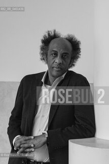 Rome March 21, 2026..Dinaw Mengestu, an Ethiopian-born American writer and novelist, a contributor to Rolling Stone, Harpers, The Wall Street Journal, and many other publications, and director of the written arts program at Bard College, photographed in Rome near Piazza Euclide/Dinaw Mengestu, scrittore e romanziere etiope naturalizzato statunitense, collaboratore delle riviste Rolling Stone,  Harpers, The Wall Street Journal e molte altre pubblicazioni, direttore del programma di arte scritta al Bard College, fotografato a Roma nei pressi di piazza Euclide. ©Rino Bianchi/Rosebud2