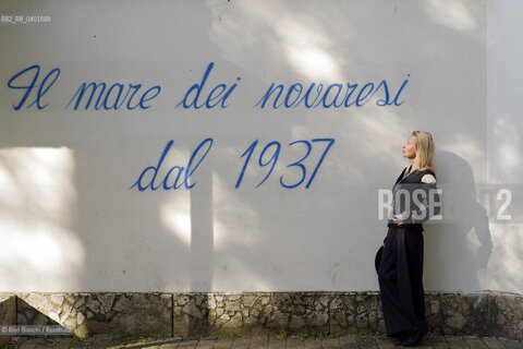 Novara March 30, 2026..Elvira Seminara, a writer and professional journalist since 1991, was an editor at the daily newspaper La Sicilia before dedicating herself entirely to fiction. She currently collaborates with LEspresso. She is pictured in Novara near the municipal swimming pool/Elvira Seminara, scrittrice, giornalista professionista dal ‘91, prima di dedicarsi interamente alla narrativa è stata redattrice nel quotidiano La Sicilia e collabora attualmente con lEspresso, fotografata a Novara nei pressi della piscina comunale. ©Rino Bianchi/Rosebud2