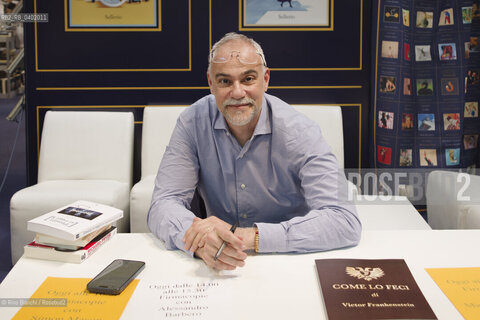 Turin May 17, 2026..Marco Malvaldi, a writer, made his fiction debut in 2007 with the mystery novel set on the Tuscan coast, La briscola in cinque, which was included in the collection I romanzi del BarLume, and was photographed in Turin at the stand of his publisher, Sellerio/Marco Malvaldi scrittore, ha esordito nella narrativa nel 2007 con il giallo ambientato sulla costa toscana La briscola in cinque,  entrato nella raccolta I romanzi del BarLume, fotografato a Torino nello stand del suo editore Sellerio. ©Rino Bianchi/Rosebud2