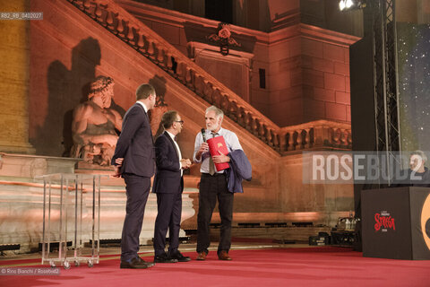 Rome July 8, 2026.Michele Mari between Pino Strabioli and Andrea DAngelo after winning the 80th edition of the Strega Prize/Michele Mari tra Pino Strabioli ed Andrea DAngelo dopo laffermazione alla 80 edizione del Premio Strega. ©Rino Bianchi/Rosebud2