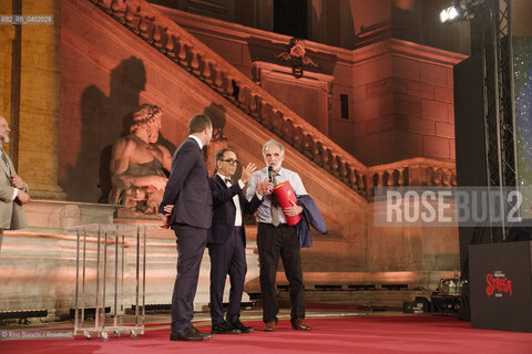 Rome July 8, 2026.Michele Mari between Pino Strabioli and Andrea DAngelo after winning the 80th edition of the Strega Prize/Michele Mari tra Pino Strabioli ed Andrea DAngelo dopo laffermazione alla 80 edizione del Premio Strega. ©Rino Bianchi/Rosebud2