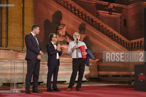 Rome July 8, 2026.Michele Mari between Pino Strabioli, Andrea DAngelo,  Gloria after winning the 80th edition of the Strega Prize/Michele Mari tra Pino Strabioli ed Andrea DAngelo dopo laffermazione alla 80 edizione del Premio Strega. ©Rino Bianchi/Rosebud2