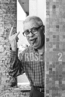 Rome May 4, 1993..Benito Franco Giuseppe Jacovitti, cartoonist, author of famous comic book characters such as Cocco Bill and Cip the Archpoliceman, graphic novels such as Kamasultra and the famous Diario Vitt, published since 1949 and which between the 1960s and 1970s sold over 3 million copies a year, exceeding a total of 100 million copies, photographed in his home in Rome/Benito Franco Giuseppe Jacovitti, fumettista, autore di celebri personaggi dei fumetti come Cocco Bill e Cip larcipoliziotto, di romanzi grafici come Kamasultra e del celebre Diario Vitt, edito dal 1949 e che fra gli anni sessanta e settanta arrivò a vendere oltre 3 milioni di copie lanno superando un totale di 100 milioni di copie, fotografato a Roma nella sua abitazione. ©Rino Bianchi/Rosebud2