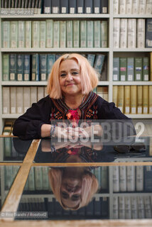 Biella September 12, 2026..Gaja Cenciarelli—a writer, translator, and teacher of English language and literature, as well as an author of novels, short stories, and critical essays—is a member of the “Piccoli Maestri” association and winner of the 2023 Alvaro-Bigiaretti Prize; she is pictured here at the Biella Civic Library during the Fuoriluogo Festival/Gaja Cenciarelli, scrittrice e traduttrice, autrice di romanzi, racconti, interventi critici, docente di lingua e letteratura inglese, fa parte dellAssociazione “Piccoli Maestri”,  ha vinto il Premio Alvaro-Bigiaretti 2023, fotografata negli spazi della Biblioteca Civica di Biella durante il Festival Fuoriluogo. ©Rino Bianchi/Rosebud2
