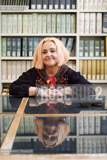 Biella September 12, 2026..Gaja Cenciarelli—a writer, translator, and teacher of English language and literature, as well as an author of novels, short stories, and critical essays—is a member of the “Piccoli Maestri” association and winner of the 2023 Alvaro-Bigiaretti Prize; she is pictured here at the Biella Civic Library during the Fuoriluogo Festival/Gaja Cenciarelli, scrittrice e traduttrice, autrice di romanzi, racconti, interventi critici, docente di lingua e letteratura inglese, fa parte dellAssociazione “Piccoli Maestri”,  ha vinto il Premio Alvaro-Bigiaretti 2023, fotografata negli spazi della Biblioteca Civica di Biella durante il Festival Fuoriluogo. ©Rino Bianchi/Rosebud2