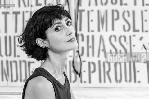 Biella September 12, 2026..Eleni Molos—actress, voice actor, author of essays and educational texts, and writer—photographed in Biella at the former De Agostini factory complex during the Fuoriluogo Festival/Eleni Molos, attrice, doppiatrice, autrice disaggi e testi per la scuola, scrittrice, fotografata a Biella negli spazi dellEx Opicicio De Agostini durante il Festival Fuoriluogo. ©Rino Bianchi/Rosebud2