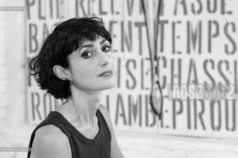 Biella September 12, 2026..Eleni Molos—actress, voice actor, author of essays and educational texts, and writer—photographed in Biella at the former De Agostini factory complex during the Fuoriluogo Festival/Eleni Molos, attrice, doppiatrice, autrice disaggi e testi per la scuola, scrittrice, fotografata a Biella negli spazi dellEx Opicicio De Agostini durante il Festival Fuoriluogo. ©Rino Bianchi/Rosebud2