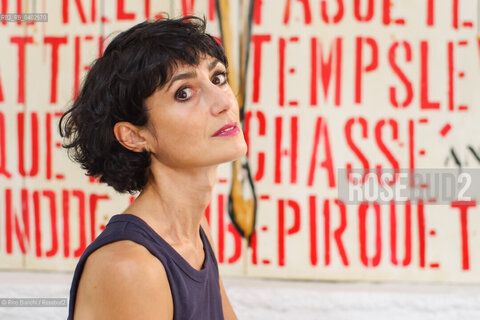 Biella September 12, 2026..Eleni Molos—actress, voice actor, author of essays and educational texts, and writer—photographed in Biella at the former De Agostini factory complex during the Fuoriluogo Festival/Eleni Molos, attrice, doppiatrice, autrice disaggi e testi per la scuola, scrittrice, fotografata a Biella negli spazi dellEx Opicicio De Agostini durante il Festival Fuoriluogo. ©Rino Bianchi/Rosebud2